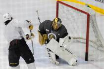 Golden Knights goaltender Marc-Andre Fleury (29) makes a save against Golden Knights forward Ch ...