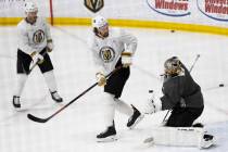 Golden Knights forward Mark Stone (61) redirects a shot at Golden Knights goaltender Marc-Andre ...