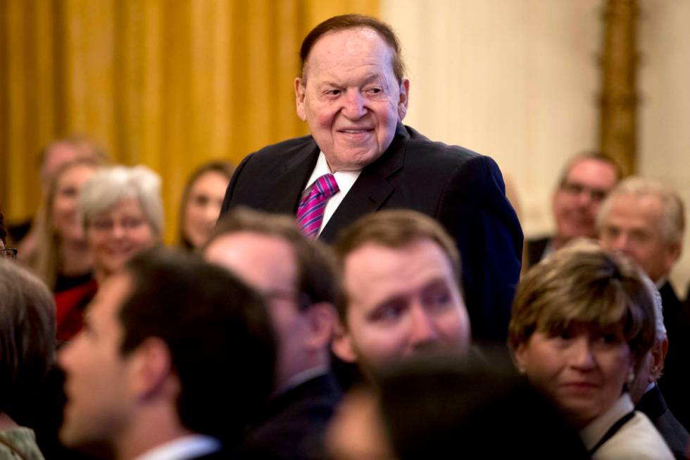Las Vegas Sands Corp. Chairman and CEO Sheldon Adelson stands as he is recognized by President ...