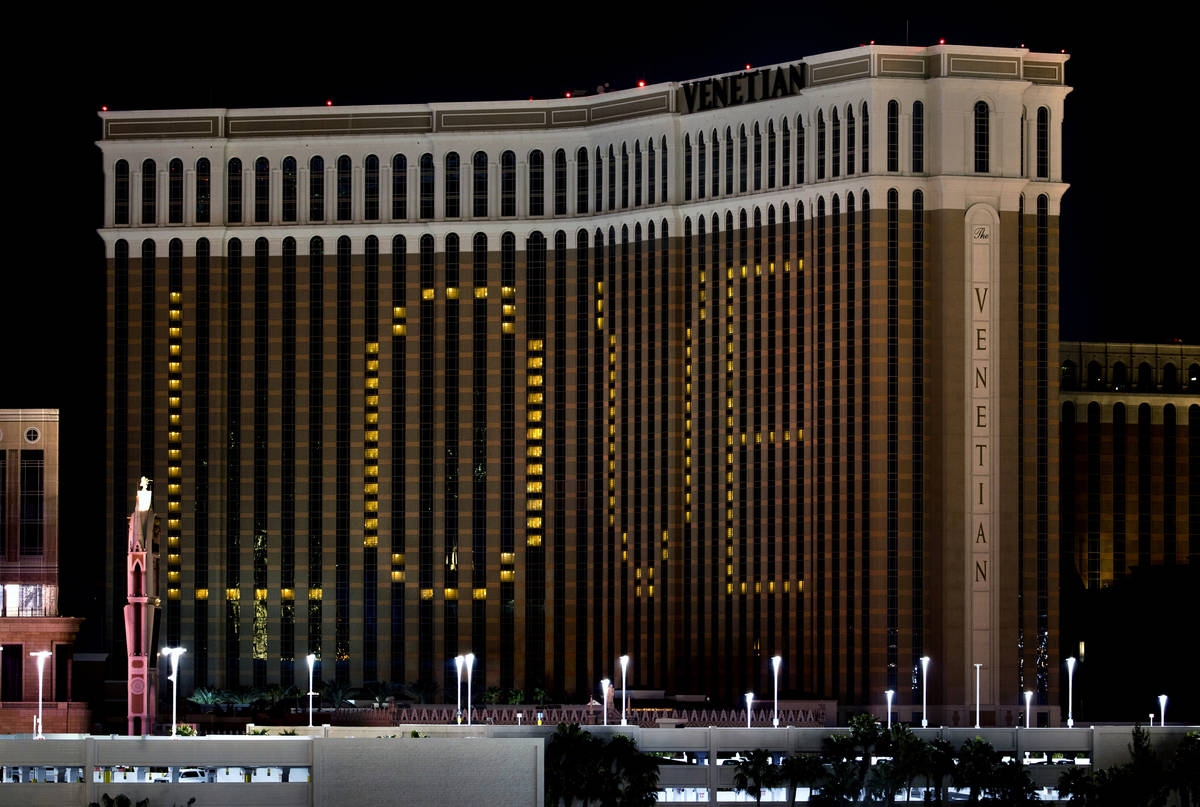 The exterior lights at The Venetian and Palazzo are turned off in support of Earth Hour on Marc ...
