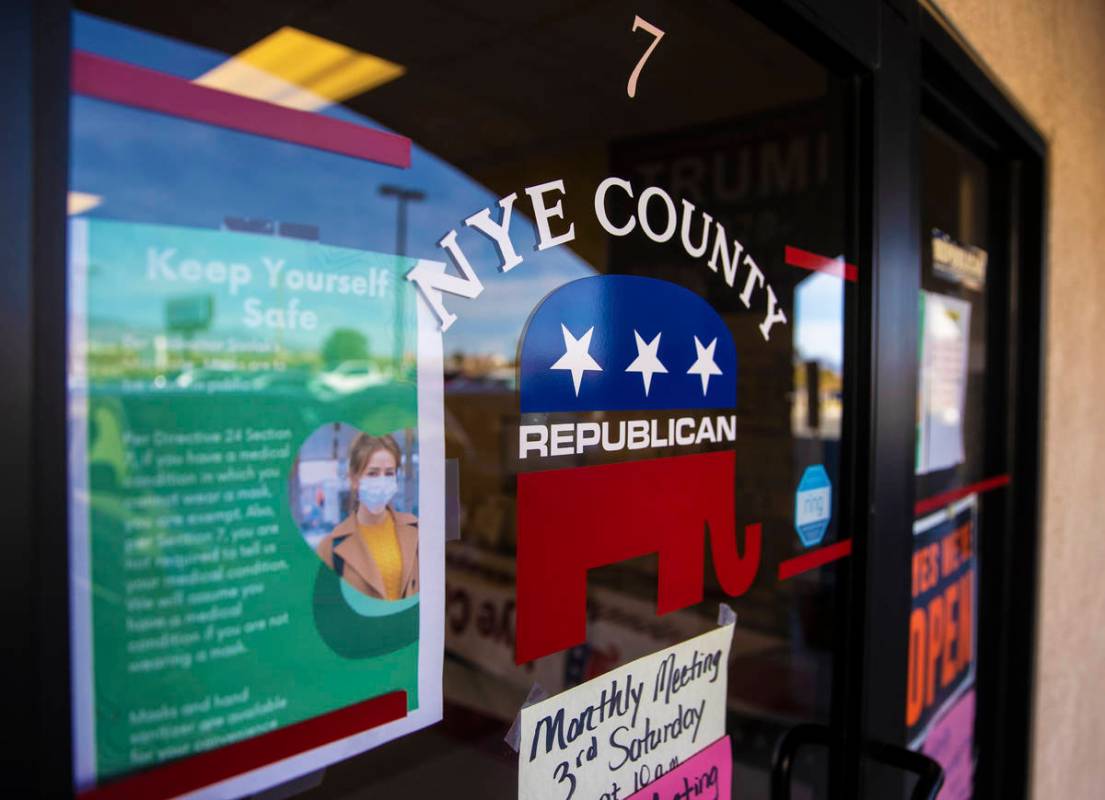 Signage outside the Nye County Republican Central Committee office on Monday, Jan. 11, 2021, in ...