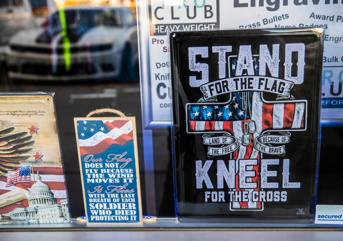 Signage in the storefront of G.I. USA on Monday, Jan. 11, 2021, in Pahrump, Nev. (Benjamin Hage ...