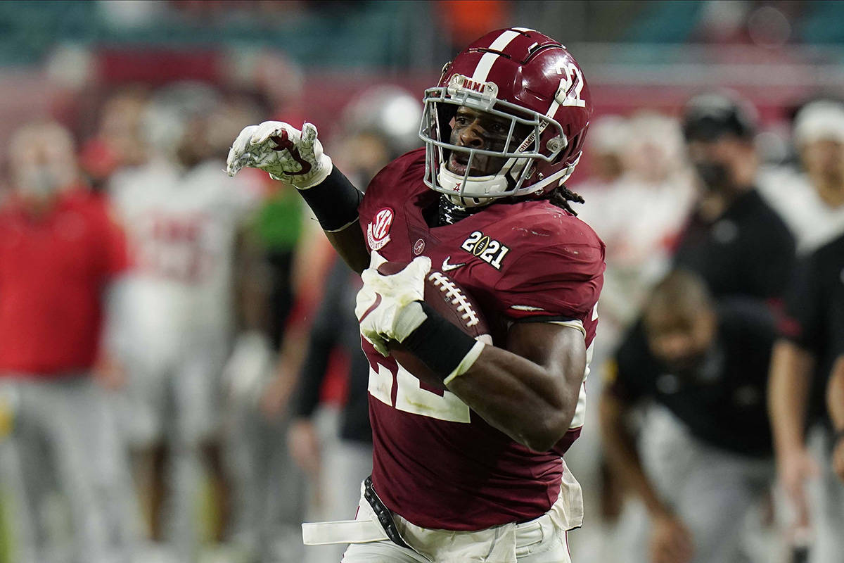 Alabama running back Najee Harris scores a touchdown against Ohio State during the first half o ...