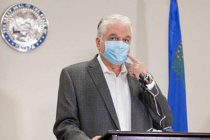 Gov. Steve Sisolak discusses Nevada’s recent COVID-19 figures during a press conference ...