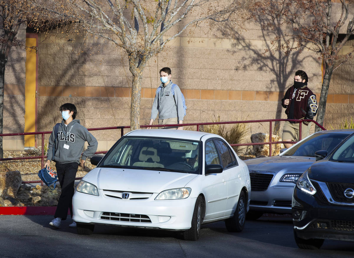 Faith Lutheran Middle School and High School students are seen after being dropped off, on Wedn ...