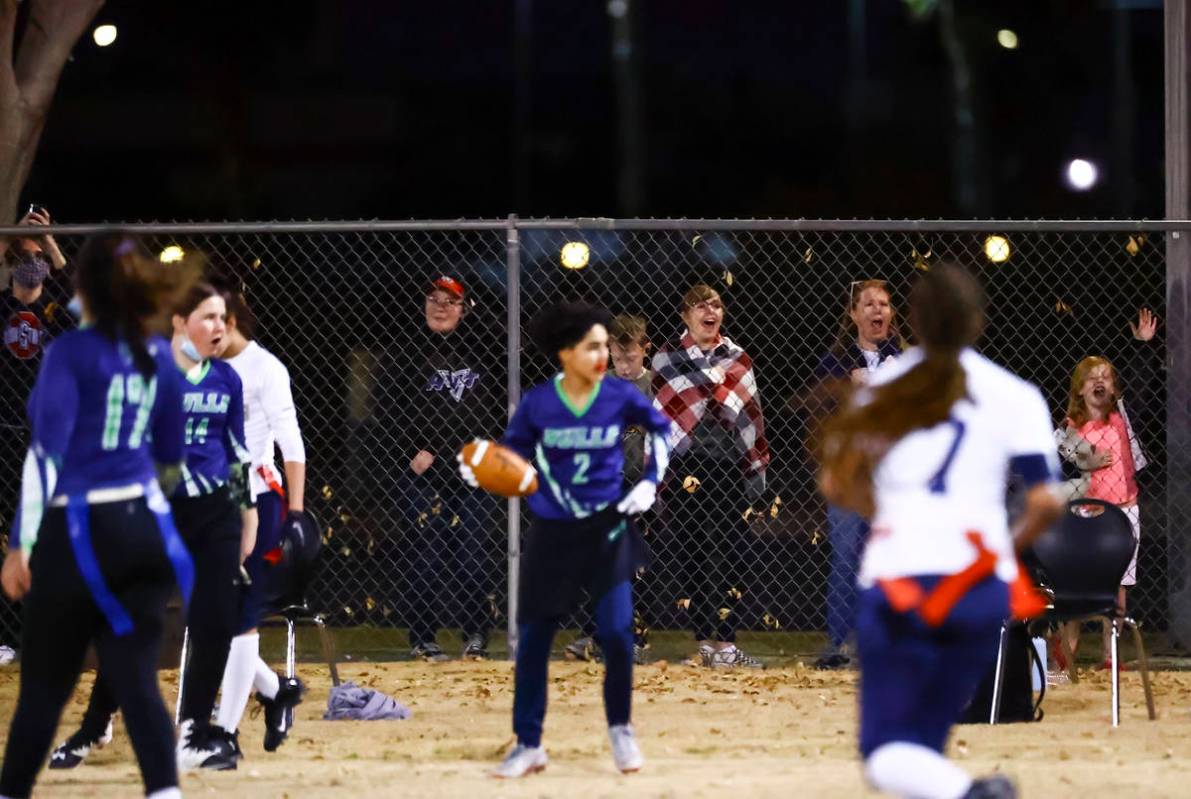 People watch the action from the sidewalk as Amplus Academy takes on SLAM! Nevada during a flag ...