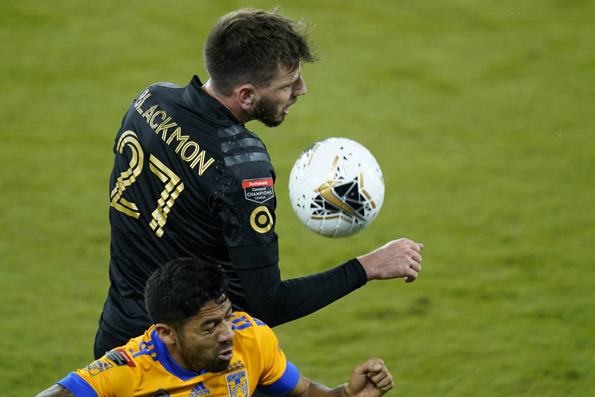 Los Angeles FC defender Tristan Blackmon (27) gets position on the ball in front of Tigres midf ...