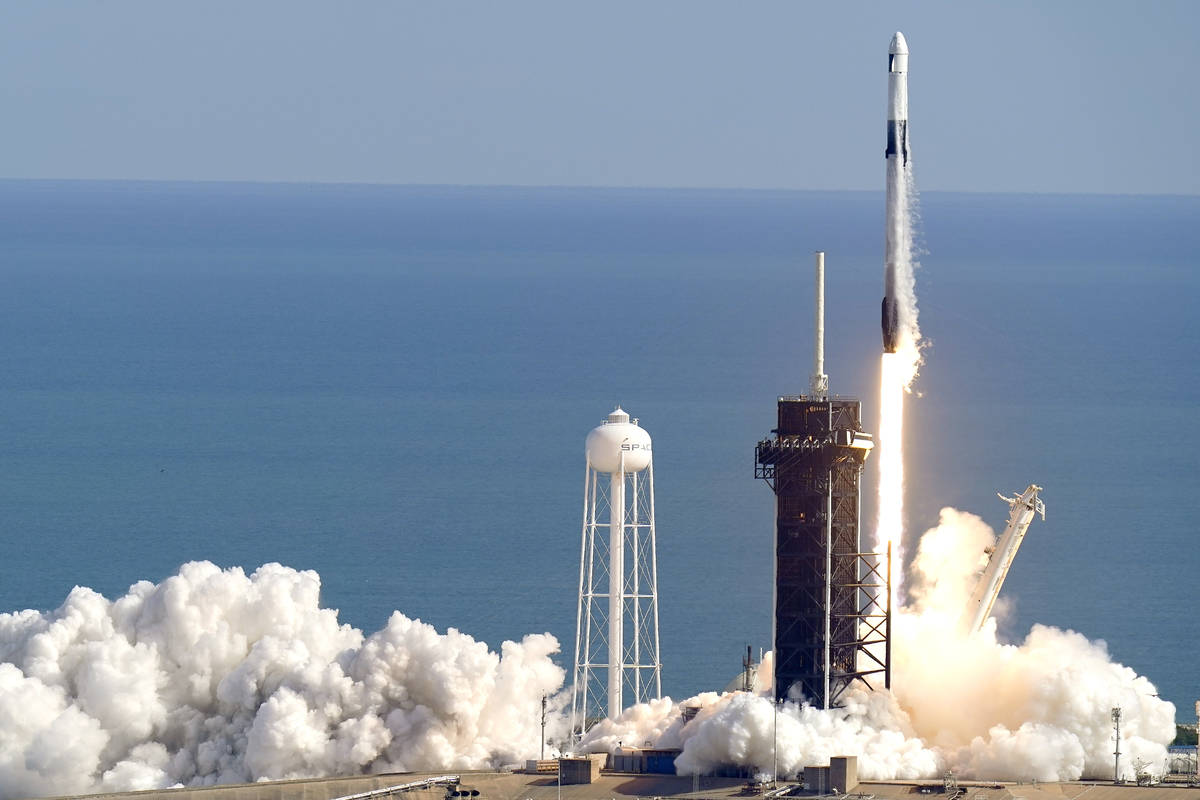 A SpaceX Falcon 9 rocket on a resupply mission to the International Space Station lifts off fro ...