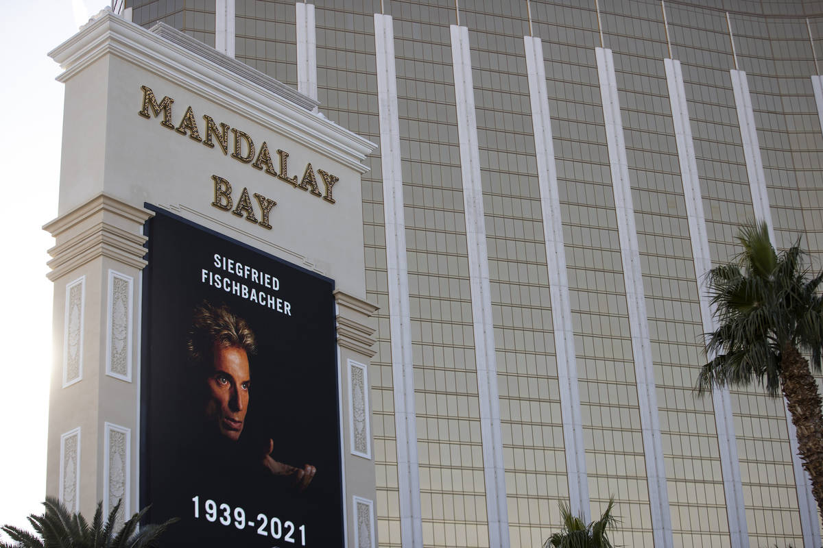 The Mandalay Bay marquee displays a picture in memory of Siegfried Fischbacher in Las Vegas, on ...
