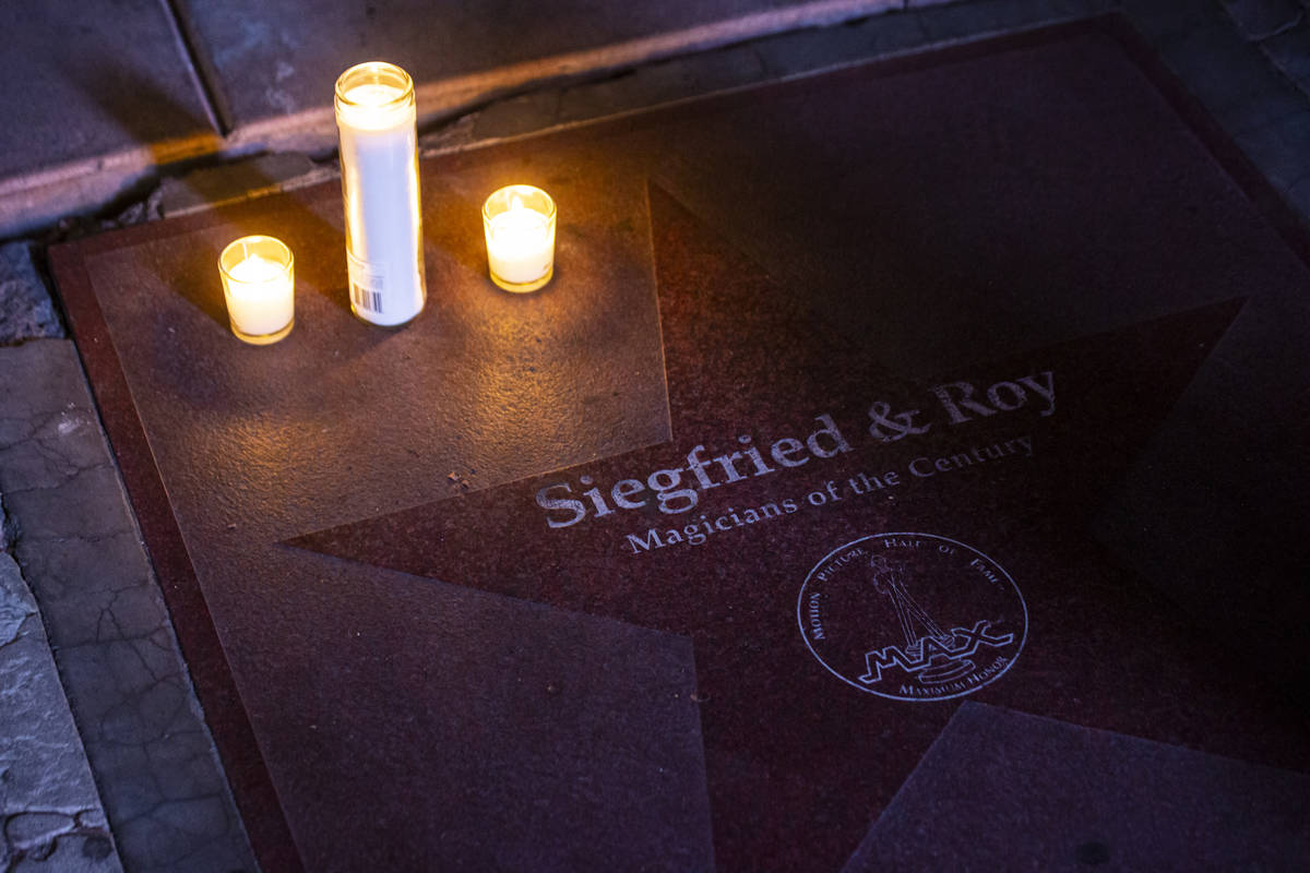 Candles are lit in memory of Siegfried Fischbacher, half of the legendary illusion team Siegfri ...