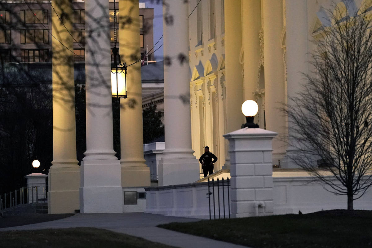 A U.S. Secret Service guard stands post at the North Portico of the White House, after the U.S. ...