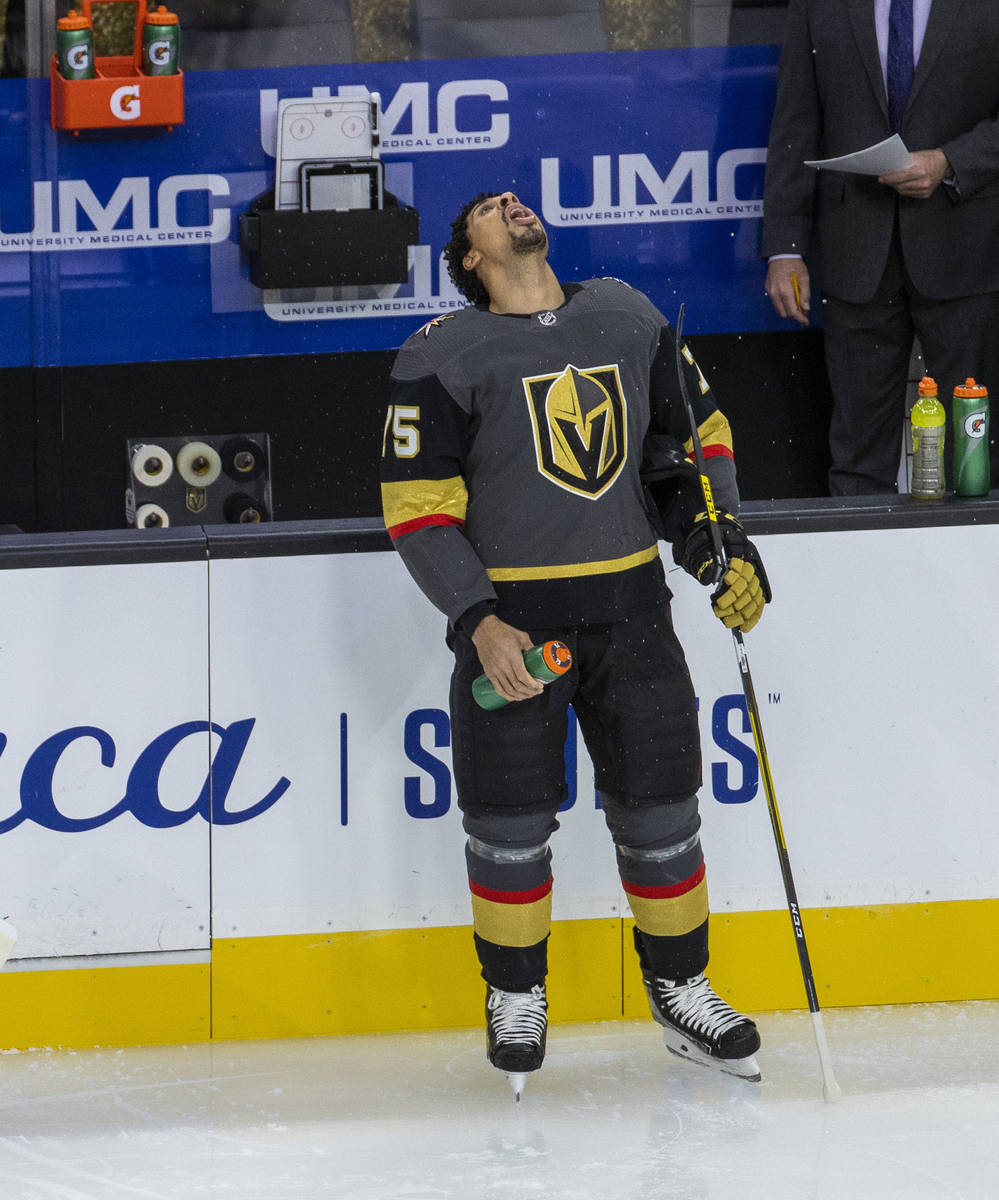 Golden Knights right wing Ryan Reaves (75) catches sprinkles of Gatorade in his mouth during th ...