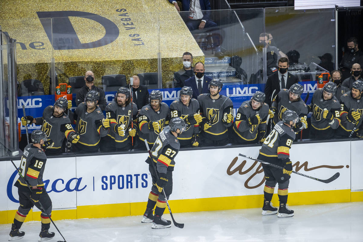 Golden Knights center Jonathan Marchessault (81) celebrates his goal with teammates during the ...