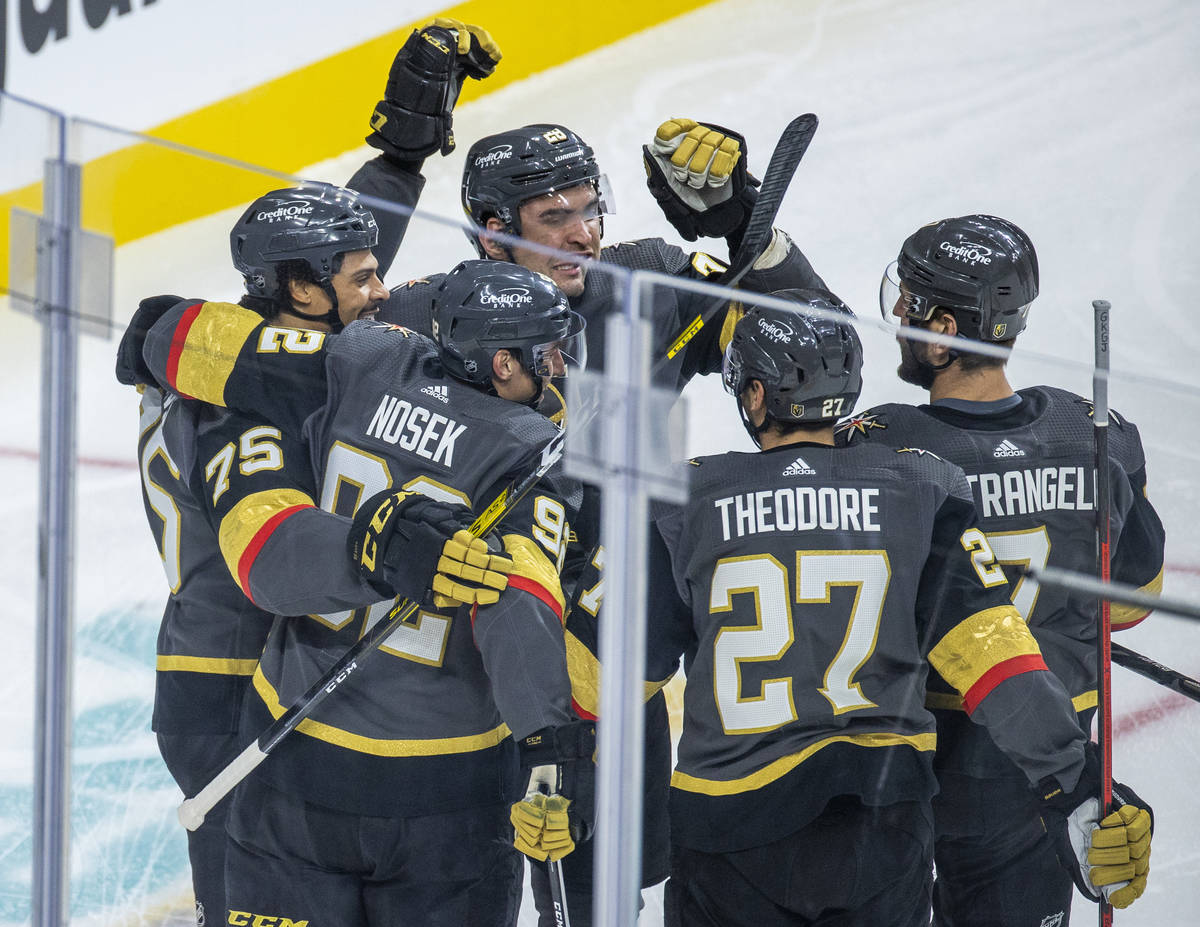 Golden Knights right wing Tomas Nosek (92) celebrates his goal with teammates versus the Anahei ...