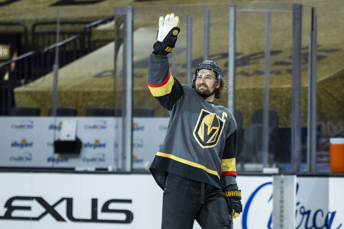 Golden Knights right wing Mark Stone (61) waves thanks to the empty seats after their 5-2 win o ...