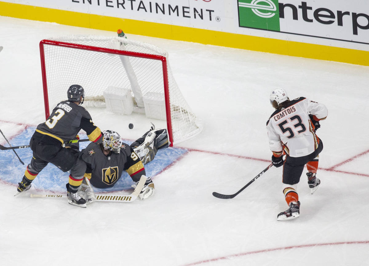Anaheim Ducks forward Max Comtois (53) scores a goal past Vegas Golden Knights goaltender Robin ...