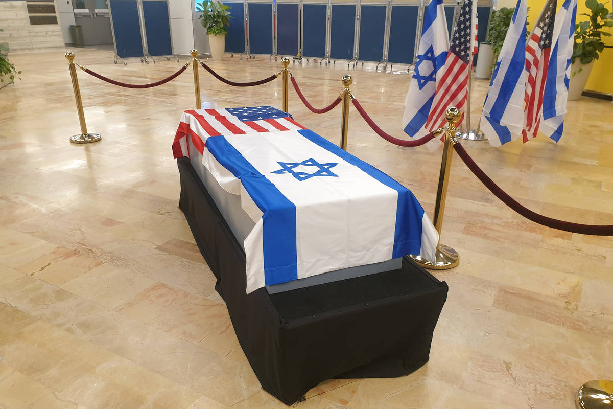 Sheldon Adelson's casket lies in repose at Ben Gurion International Airport in Tel Aviv, Israel ...