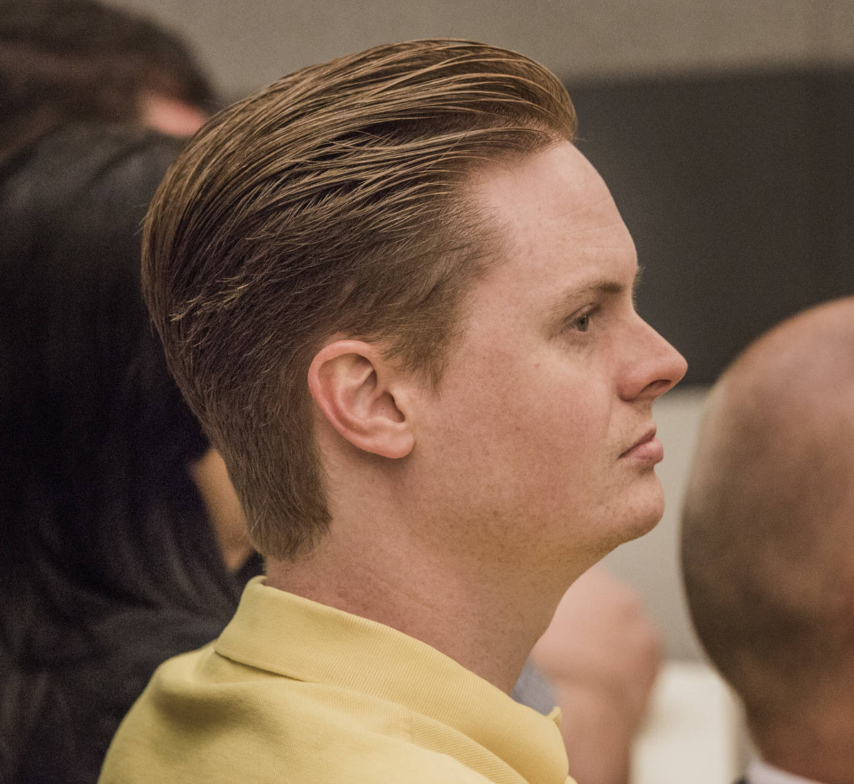 Christopher Cooney attends his mother's sentencing at the Regional Justice Center on July 9, 20 ...