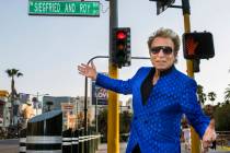 Siegfried Fischbacher watches while the Mirage porte cochere is renamed Siegfried & Roy Drive i ...