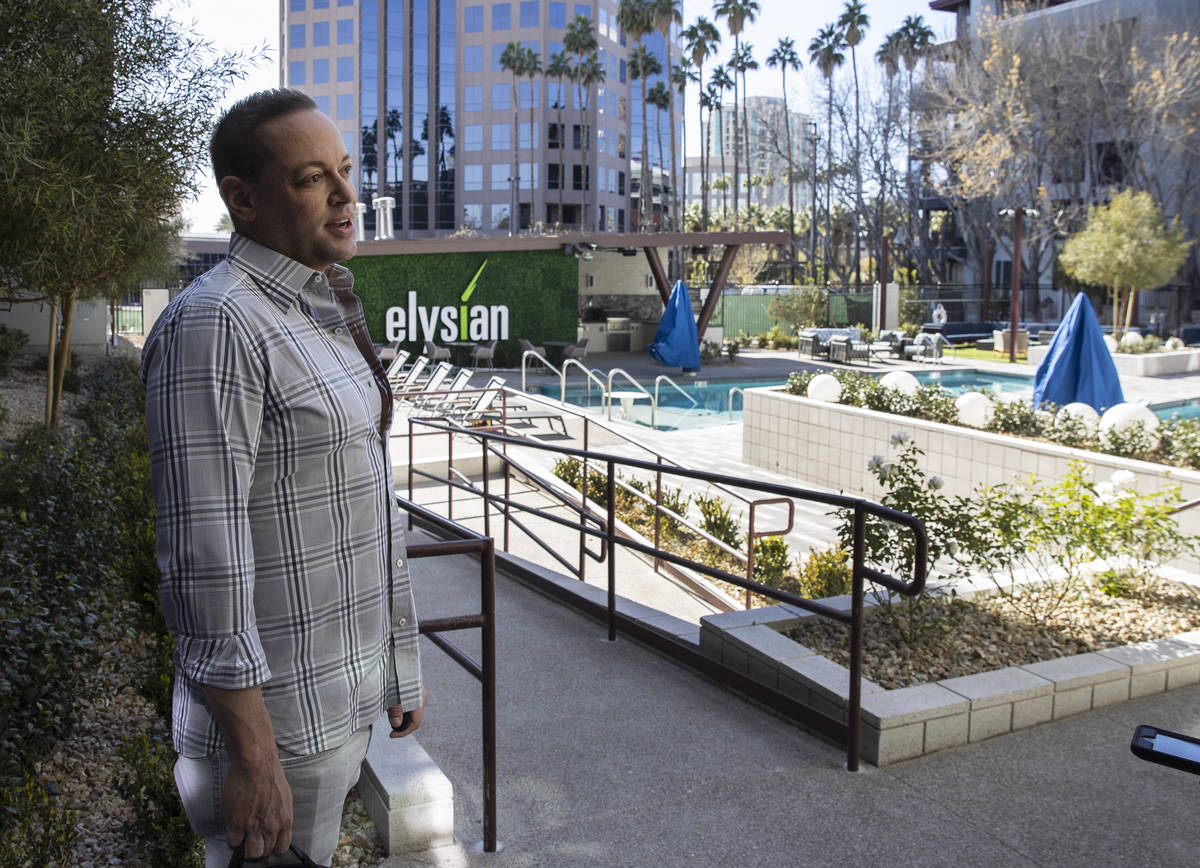 Eric Cohen, cofounder of The Calida Group, leads a tour of Elysian at Hughes Center, an apartme ...