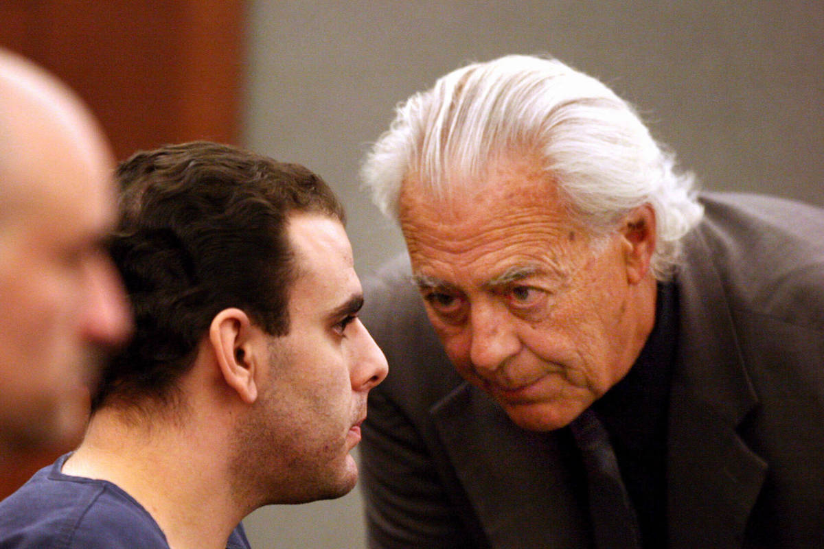 In this Aug.25, 2011, file photo, attorney Bill Terry, right, talks with his client Anthony Car ...