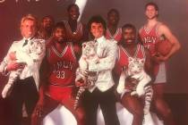 Magicians Siegfried & Roy and their white tiger pups shared the cover of the 1986-87 UNLV baske ...