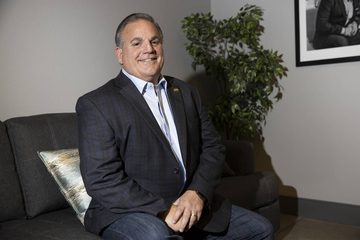 Thomas Blanchard, managing broker for Signature Real Estate Group, poses for a portrait at his ...