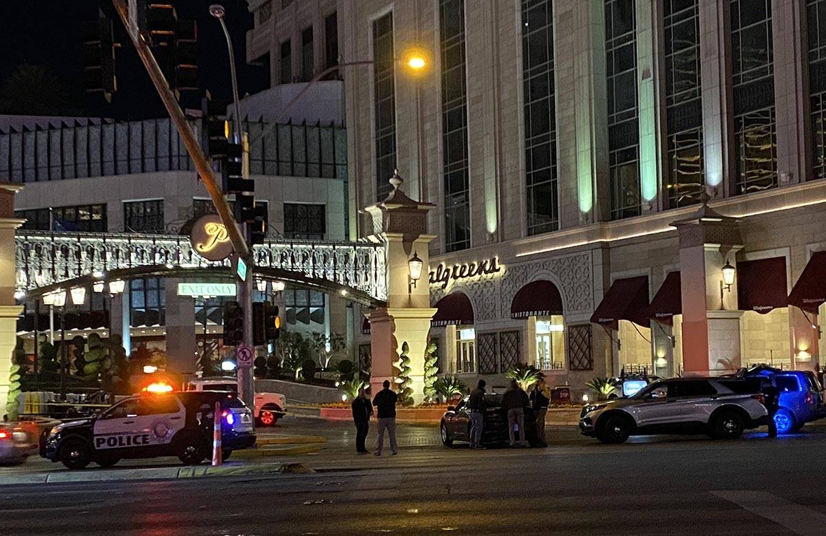 Las Vegas police vehicles on the Strip early Monday, Jan. 18, 2021, as officers investigate a s ...