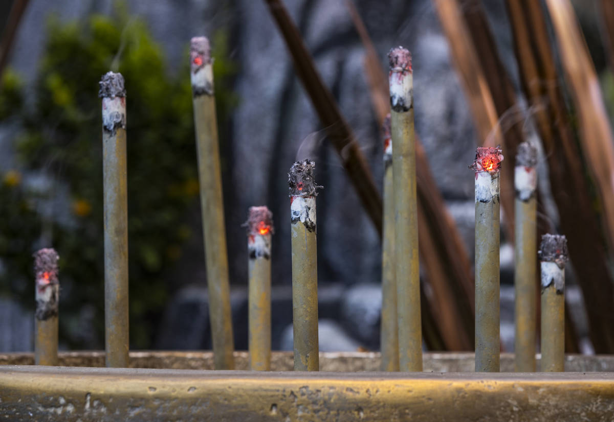 Incense smokes about copper leaves as the Bellagio Conservatory & Botanical Gardens debut its d ...