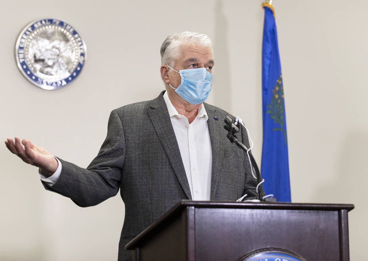 Gov. Steve Sisolak discusses Nevada’s recent COVID-19 figures during a press conference ...
