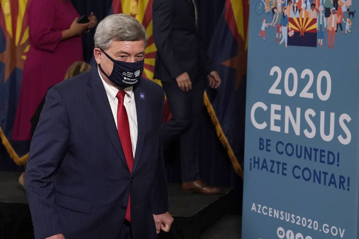 U.S. Census Director Steven Dillingham departs a census news conference to urge Arizonans to pa ...