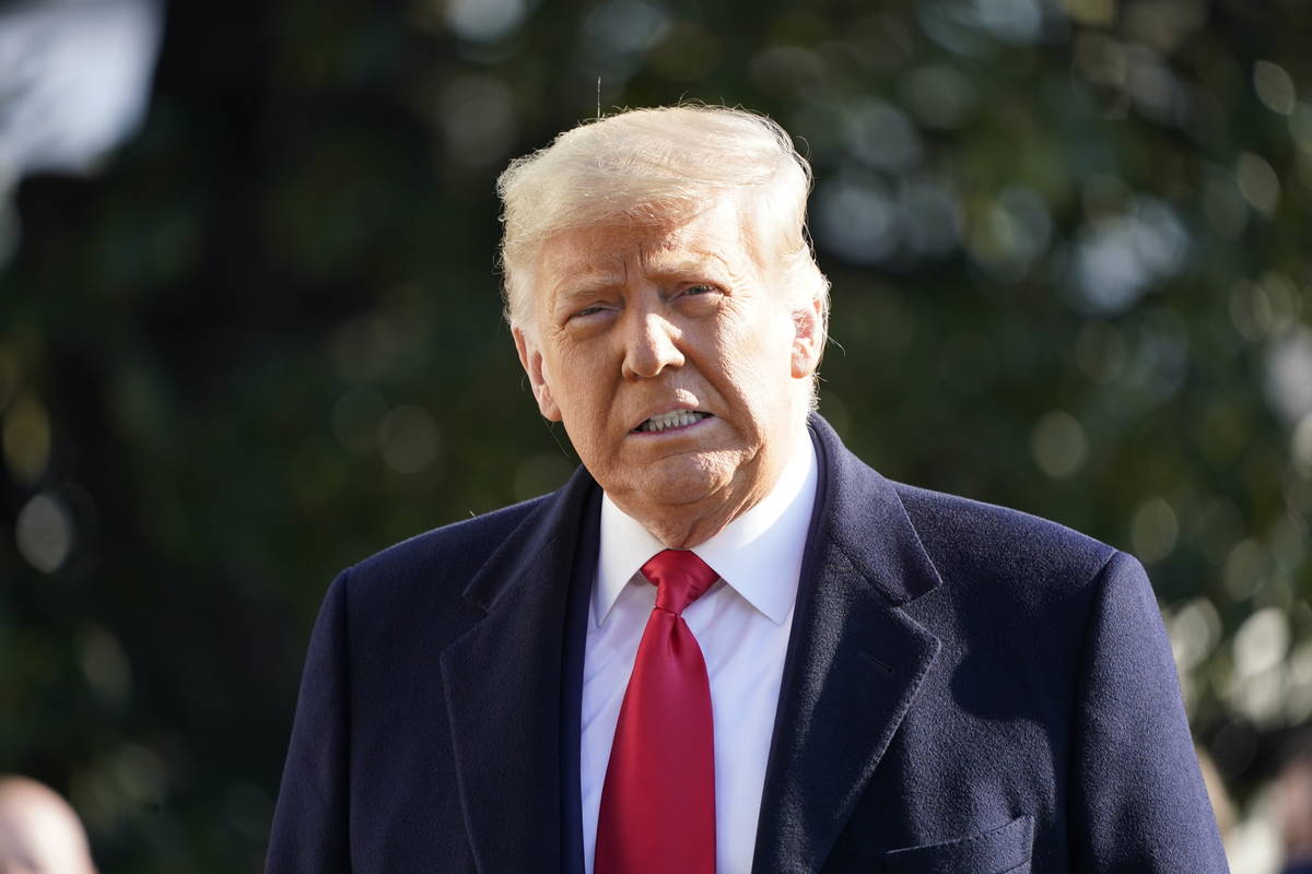 President Donald Trump speaks to the media before boarding Marine One on the South Lawn of the ...