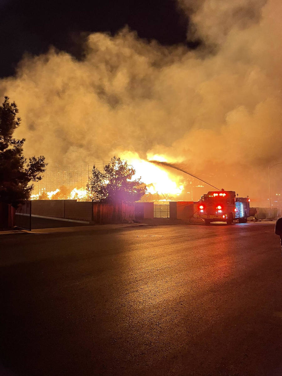 Fire crews battle a large fire in southwest Las Vegas early Tuesday, Jan. 19, 2021. (Dillon Nie ...