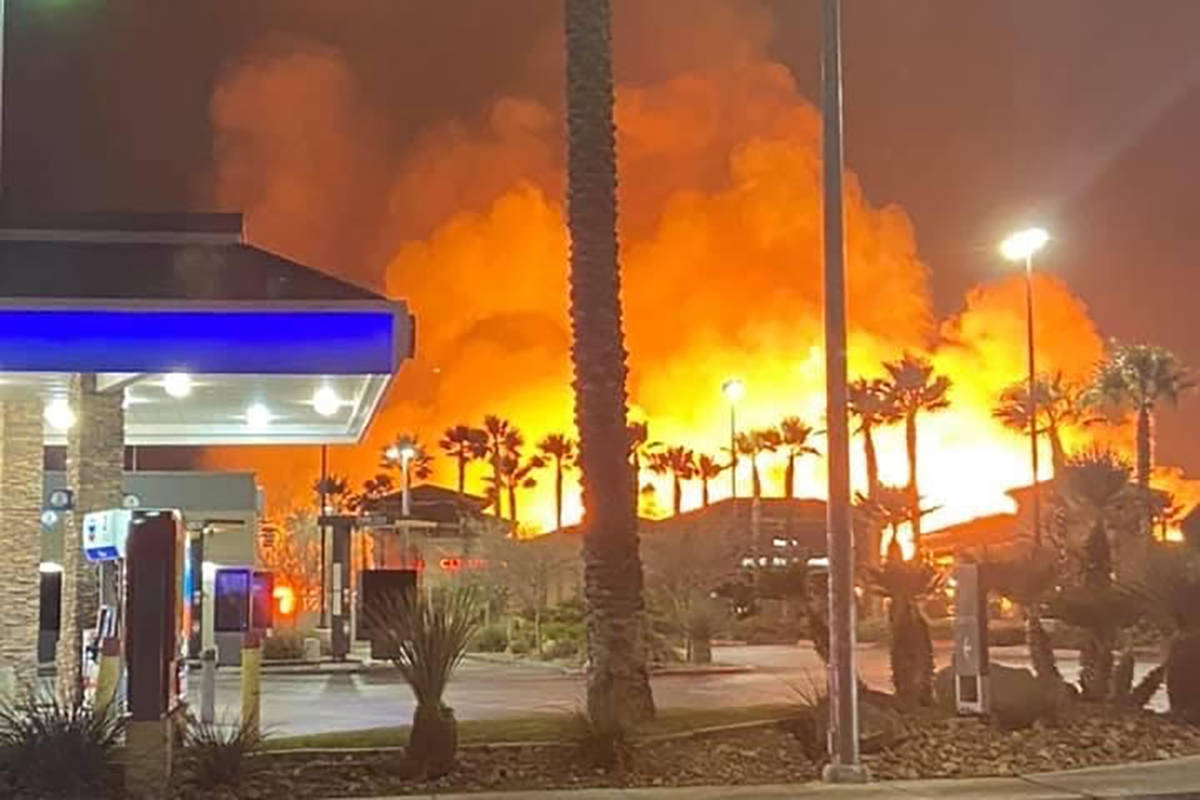 Fire crews battle a large fire in southwest Las Vegas early Tuesday, Jan. 19, 2021. (Joshua Taylor)