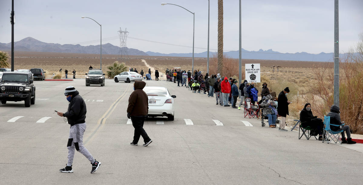 People line up to buy Powerball and Mega Millions lottery tickets at the Primm Valley Lotto Sto ...