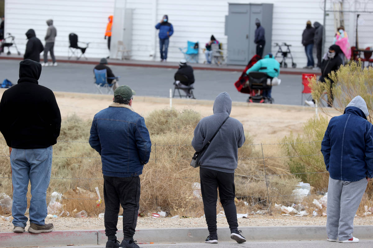 People line up to buy Powerball and Mega Millions lottery tickets at the Primm Valley Lotto Sto ...