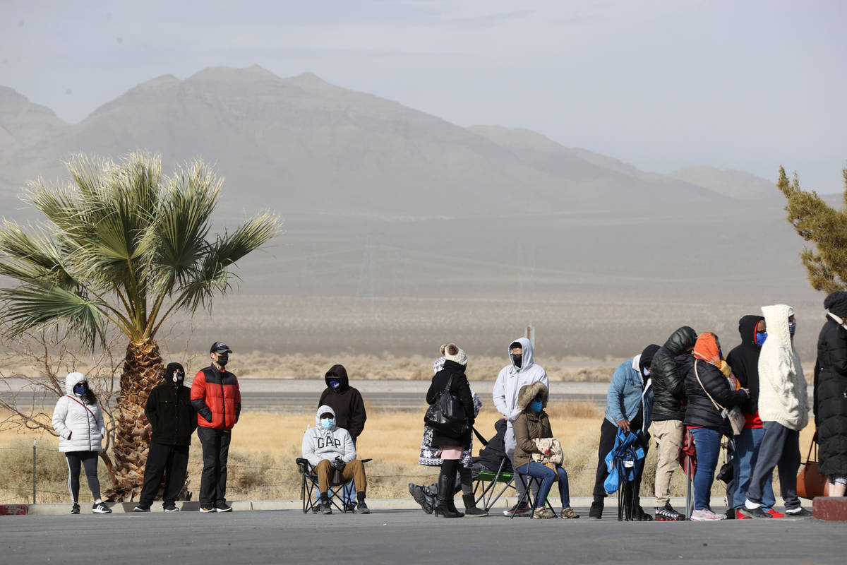 People line up to buy Powerball and Mega Millions lottery tickets at the Primm Valley Lotto Sto ...
