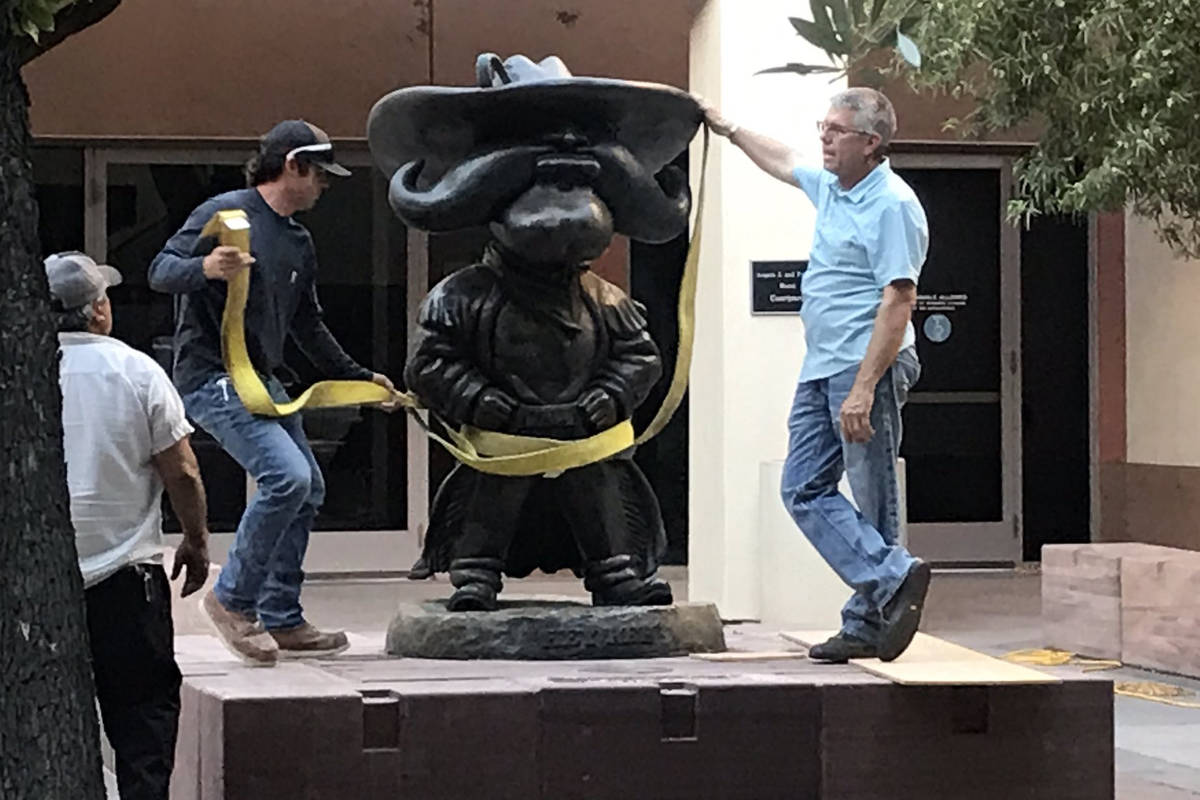 UNLV works to remove the Hey Reb! statue from in front of the Tam Alumni Center on Tuesday, Jun ...