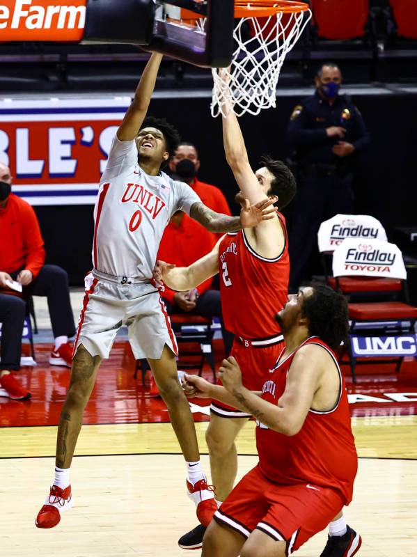 UNLV Rebels guard Donavan Yap (0) goes to the basket against Benedictine Mesa Redhawks' Bryce C ...