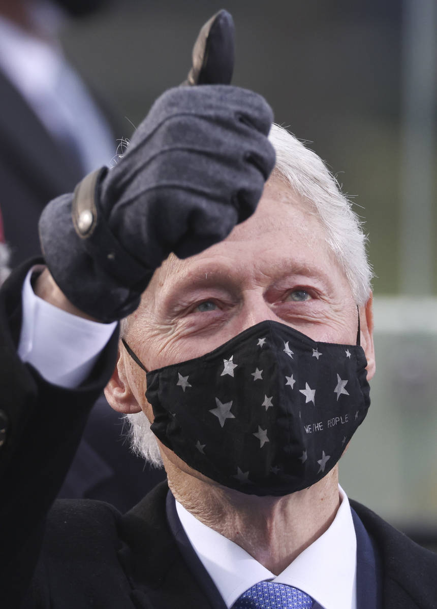 Former U.S. President Bill Clinton gestures as he attends President-elect Joe Bidenճ inau ...