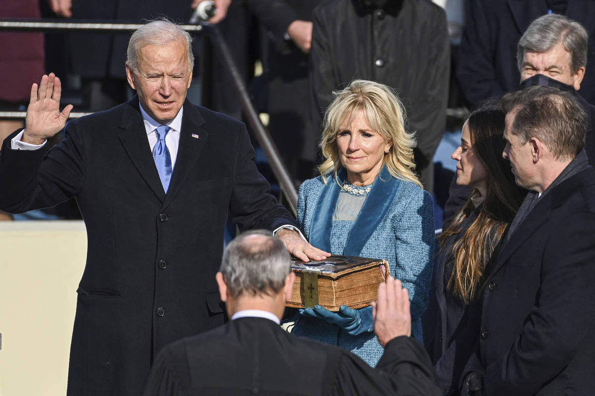Joe Biden is sworn in as the 46th president of the United States by Chief Justice John Roberts ...