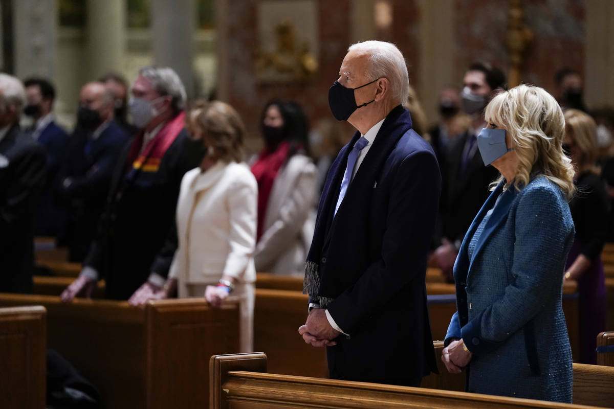 President-elect Joe Biden and his wife Jill Biden attend Mass at the Cathedral of St. Matthew t ...