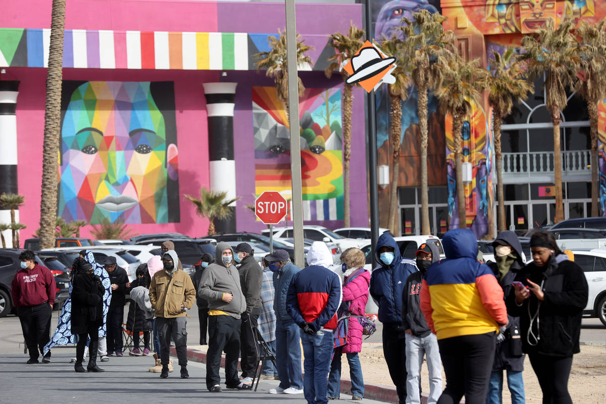 People line up to buy Powerball and Mega Millions lottery tickets at the Primm Valley Lott ...