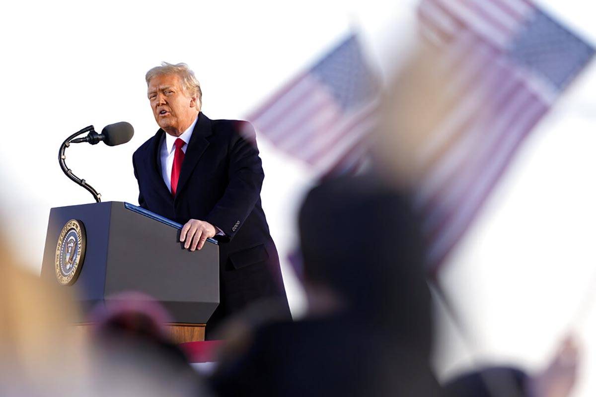 President Donald Trump speaks before boarding Air Force One at Andrews Air Force Base, Md., Wed ...