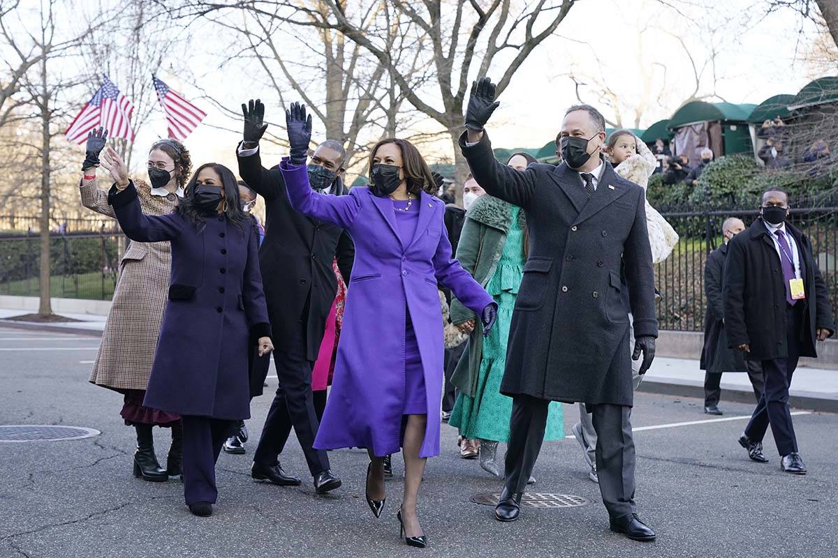 Vice President Kamala Harris, and her husband Doug Emhoff, and family, walk near the White Hous ...