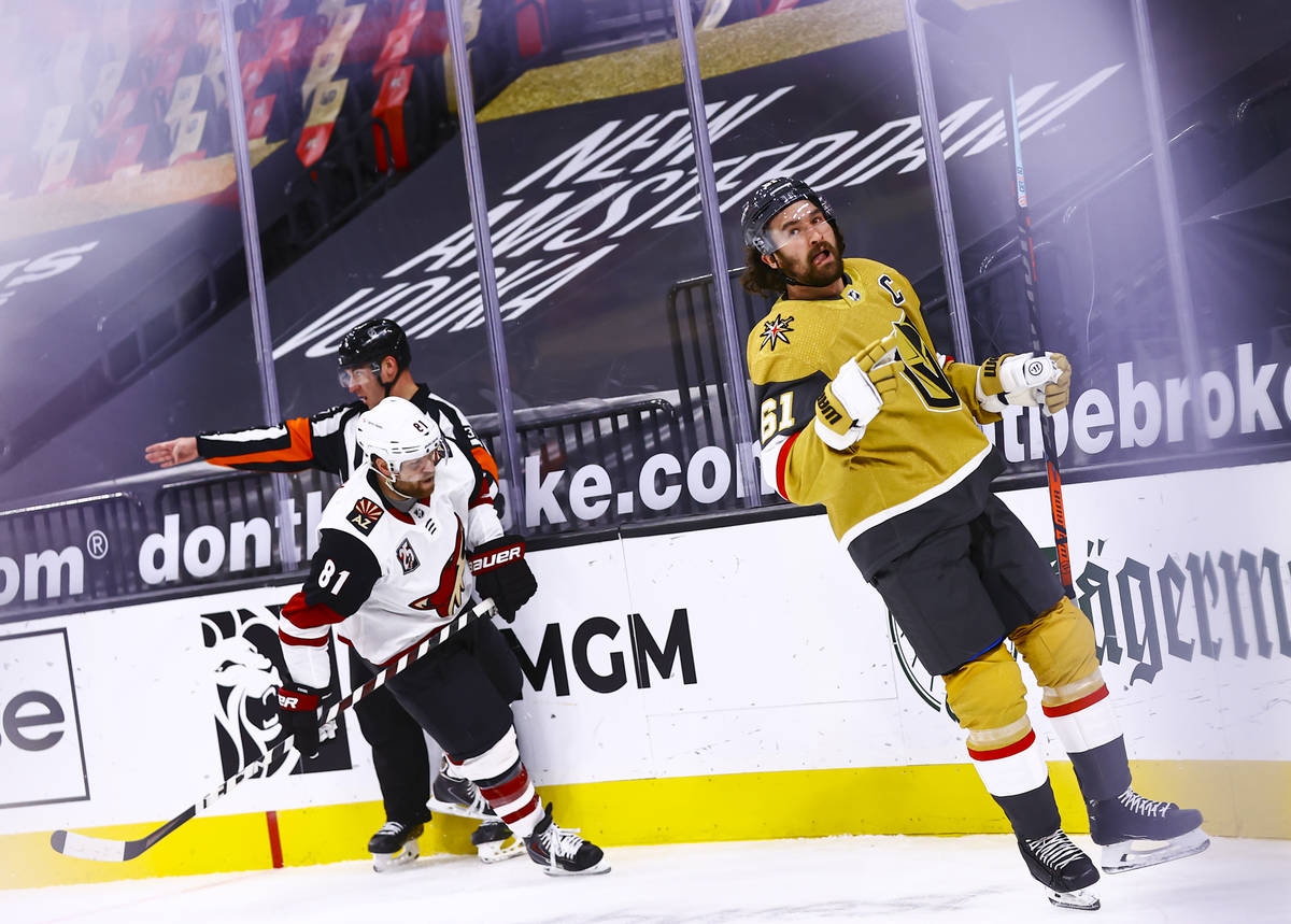 Golden Knights right wing Mark Stone (61) reacts after scoring a goal against the Arizona Coyot ...