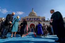 Joe Biden takes the stage to be sworn in as the 46th president of the United States by Chief Ju ...