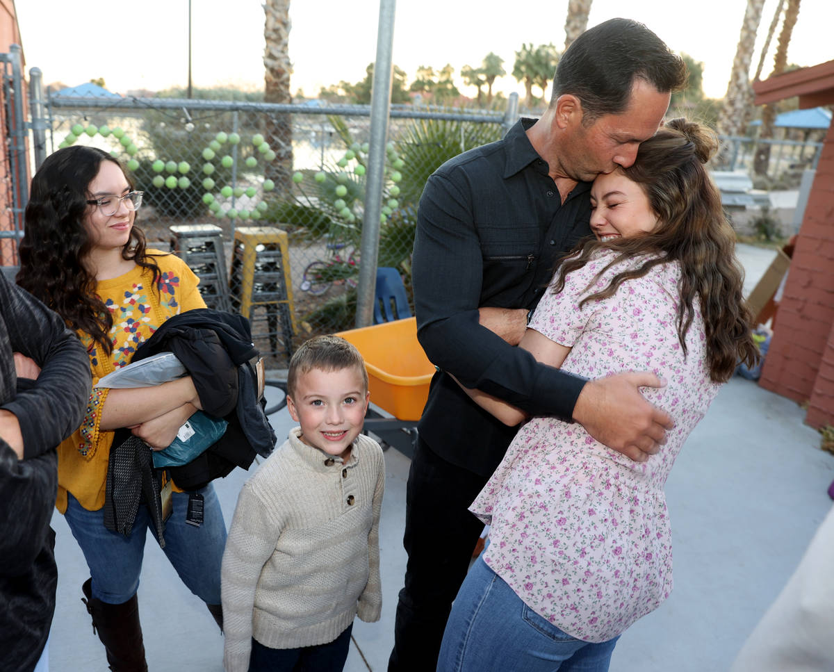 Kyle Kimoto gets a hug from his daughter Kahlea Kimoto, 20, at Jewel's Marty Hennessy Inspiring ...