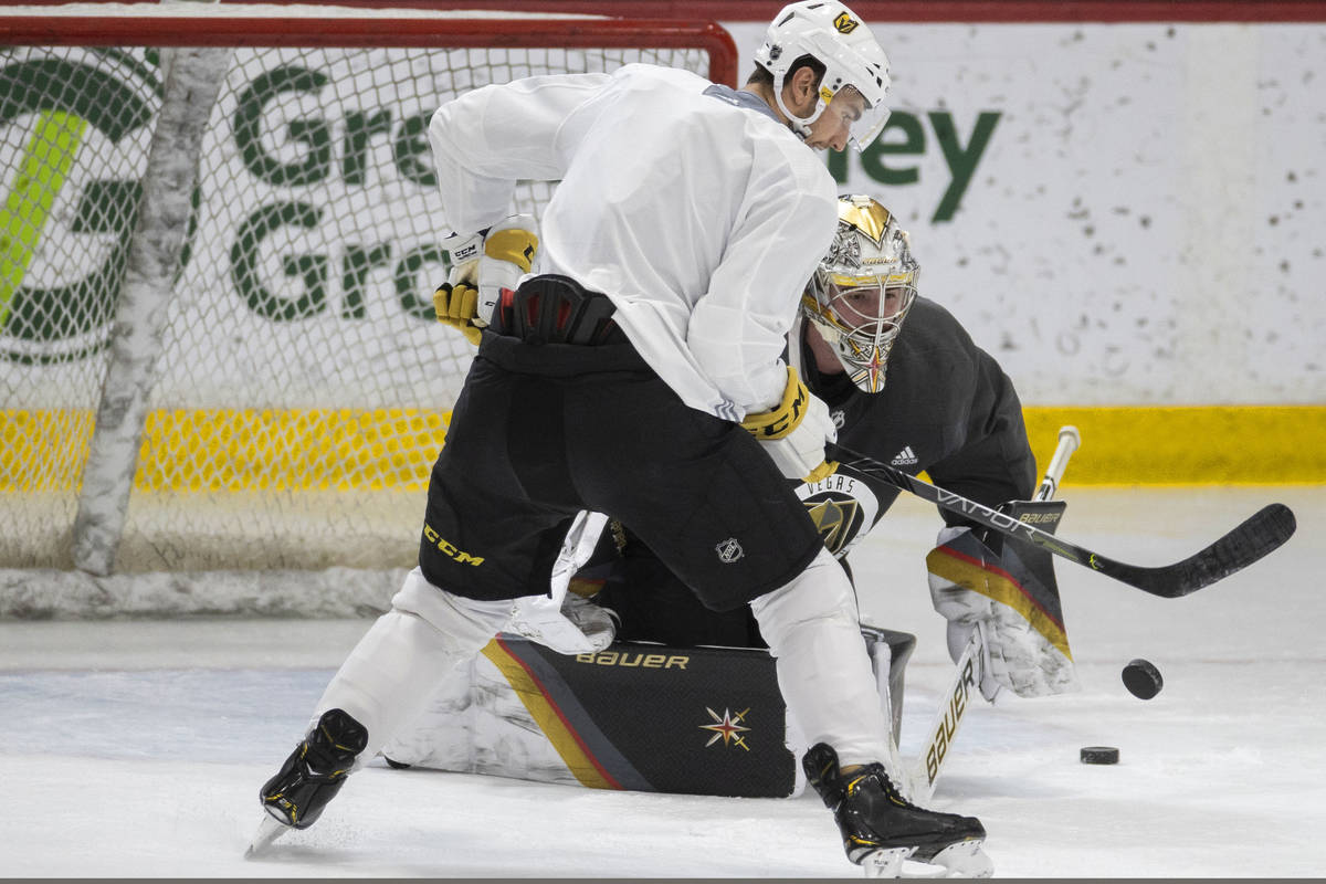 Golden Knights forward Nicolas Roy (10) shoots on Golden Knights goaltender Logan Thompson (36) ...