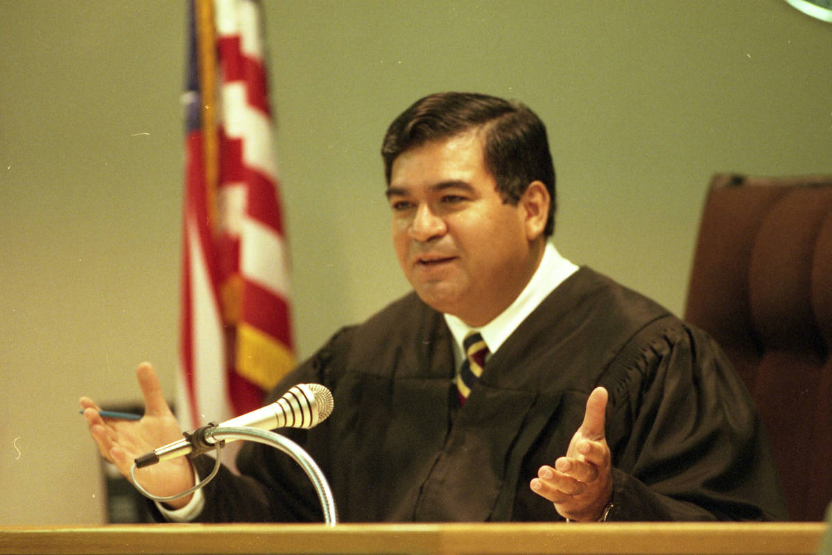 District Judge Don Chairez speaks during an arraignment in the Clark County Courthouse in Las V ...